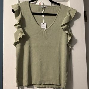 Top with shoulder flares